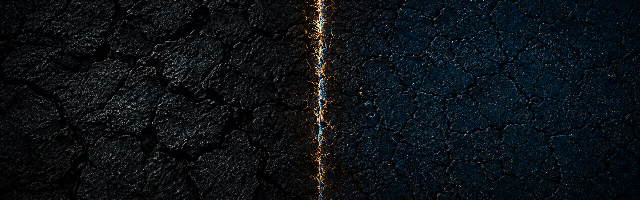 A thin gold-lit boundary divides two dark cracked surfaces.