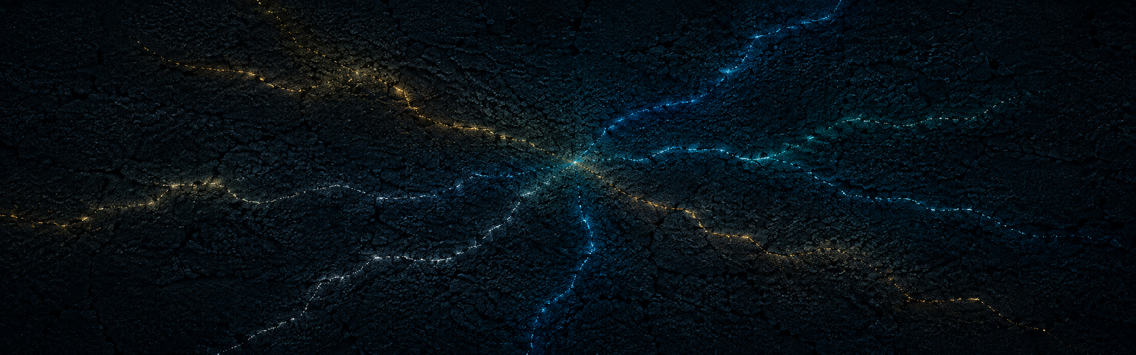 Blue and gold branching lines approach one another across a dark cracked field.